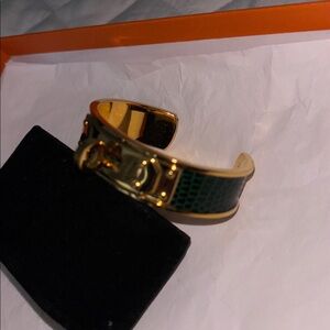 Hermes Gold and Green Wearable wrist bangle